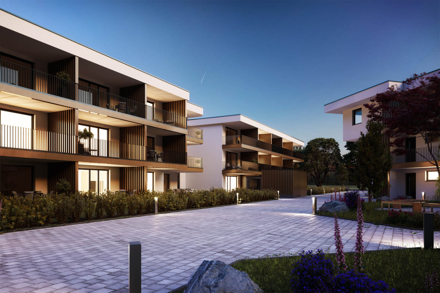 Realistische 3D-Visualisierung eines Mehrparteienhauses mit Innenhof, Spielplatz und abendlicher Lichtstimmung in Marchtrenk