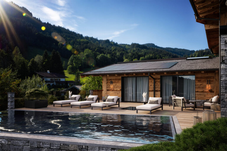 Hochwertige 3D-Visualisierung eines Neubau-Chalets mit Infinity-Pool und edler Innenarchitektur in Reith bei Kitzbühel