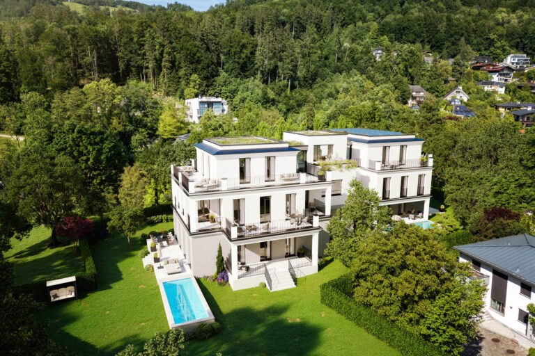 AssetX Wohnanlage in Salzburg mit moderner Villa-Architektur und Pool